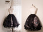 (Black) Tulle-overlay printed skirt (includes one pair of shell-button bows) / S