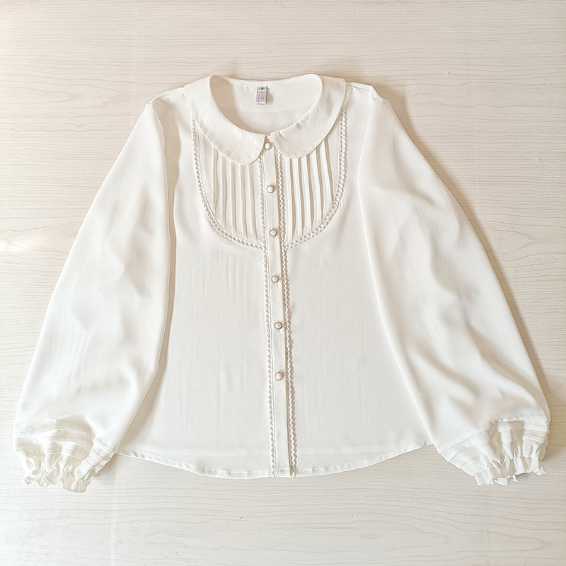 White chiffon Lolita blouse with a Peter Pan collar, frill front, and long sleeves.