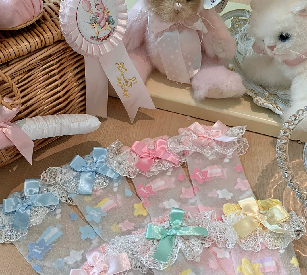 roji roji sheer mid-calf socks with lace cuffs and bow accents in pastel colourways