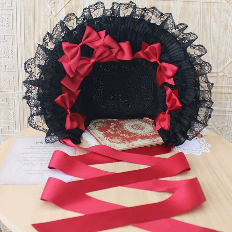 Black lace Lolita flat hat with ribbon bows shown in cream and black colourways.