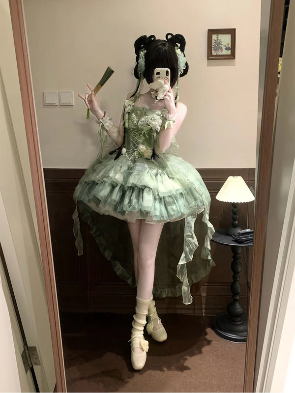 Creamy green Chinese-style Lolita dress with layered ruffles, hand sleeves and trailing train