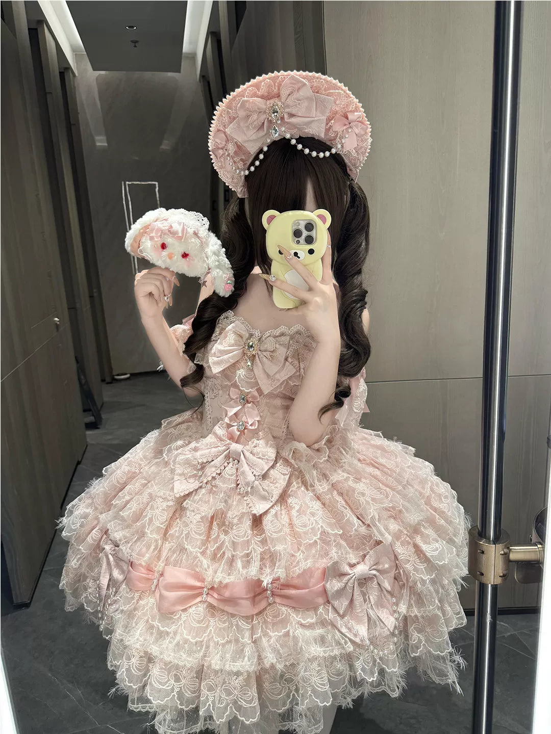 Pink Creamy JSK with layered lace ruffles, oversized bows and pearl accents