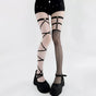 Straps with fishnet over-the-knee socks / One Size