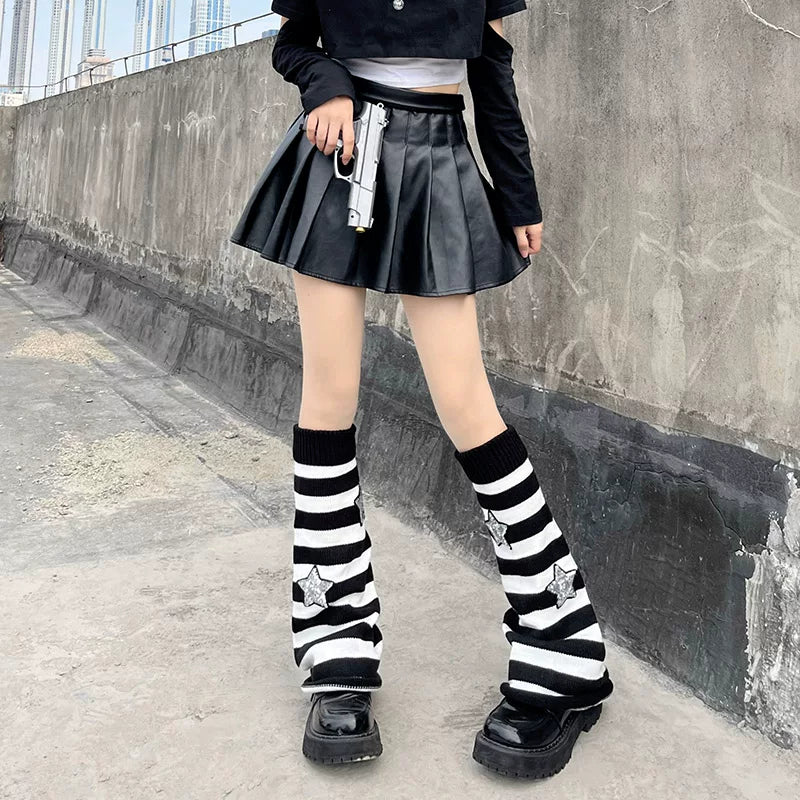 Black-white striped knit leg warmer with sequin star details