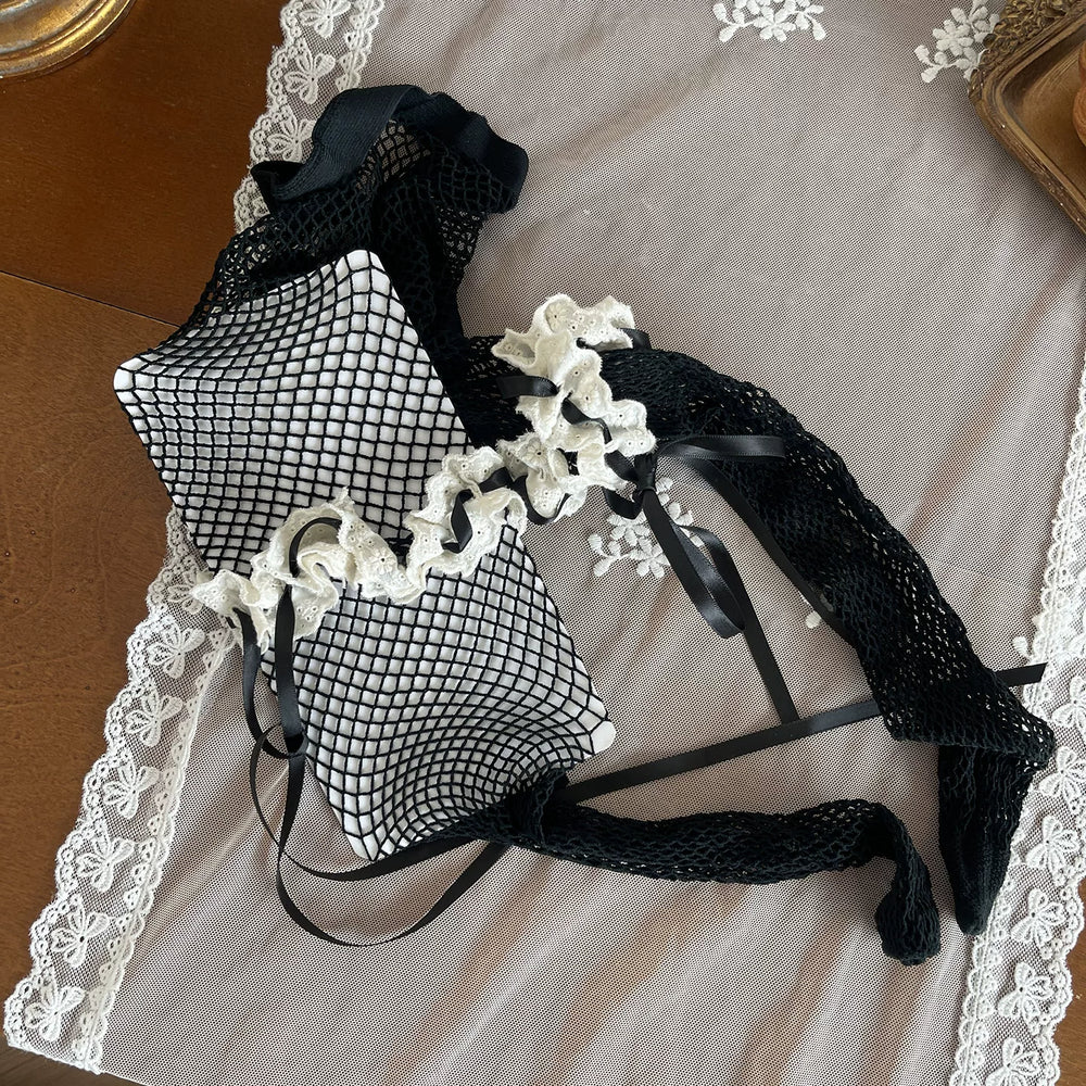 Sock Noble black layered fishnet and lace hosiery with white ruffles