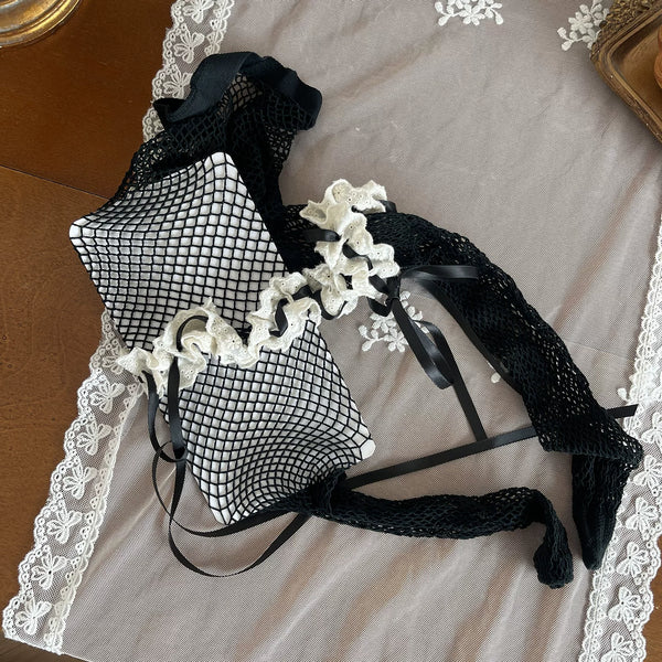Sock Noble black layered fishnet and lace hosiery with white ruffles