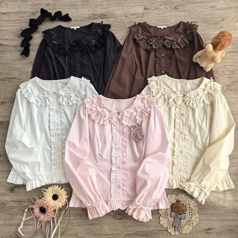 Flat-lay of ruffled long-sleeve blouses in white, natural, pink, coffee and black.