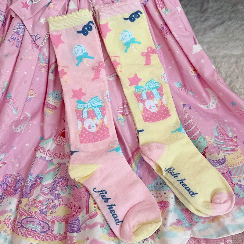 Pink and yellow cotton calf socks with candy jar gift box motifs and lace trim
