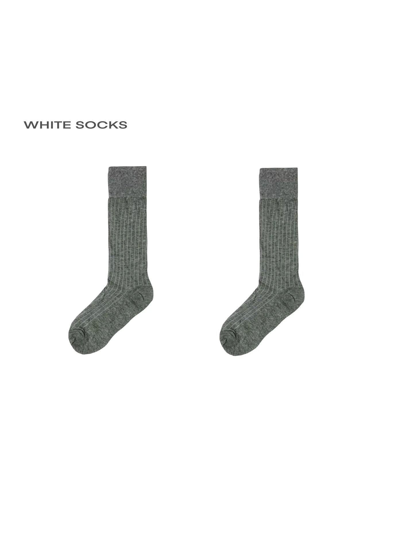 Gray ribbed slouch calf socks styled with a dark blue dress and black heels.