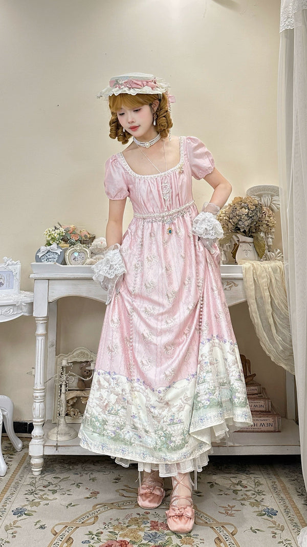 Cat Upon Cat Angel Garden pink empire-waist dress with puff sleeves and a garden scene hem.