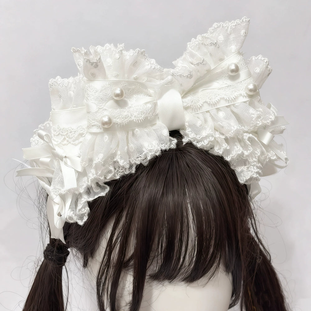 Cat Tart layered lace headwear with ribbon bows and pearl accents