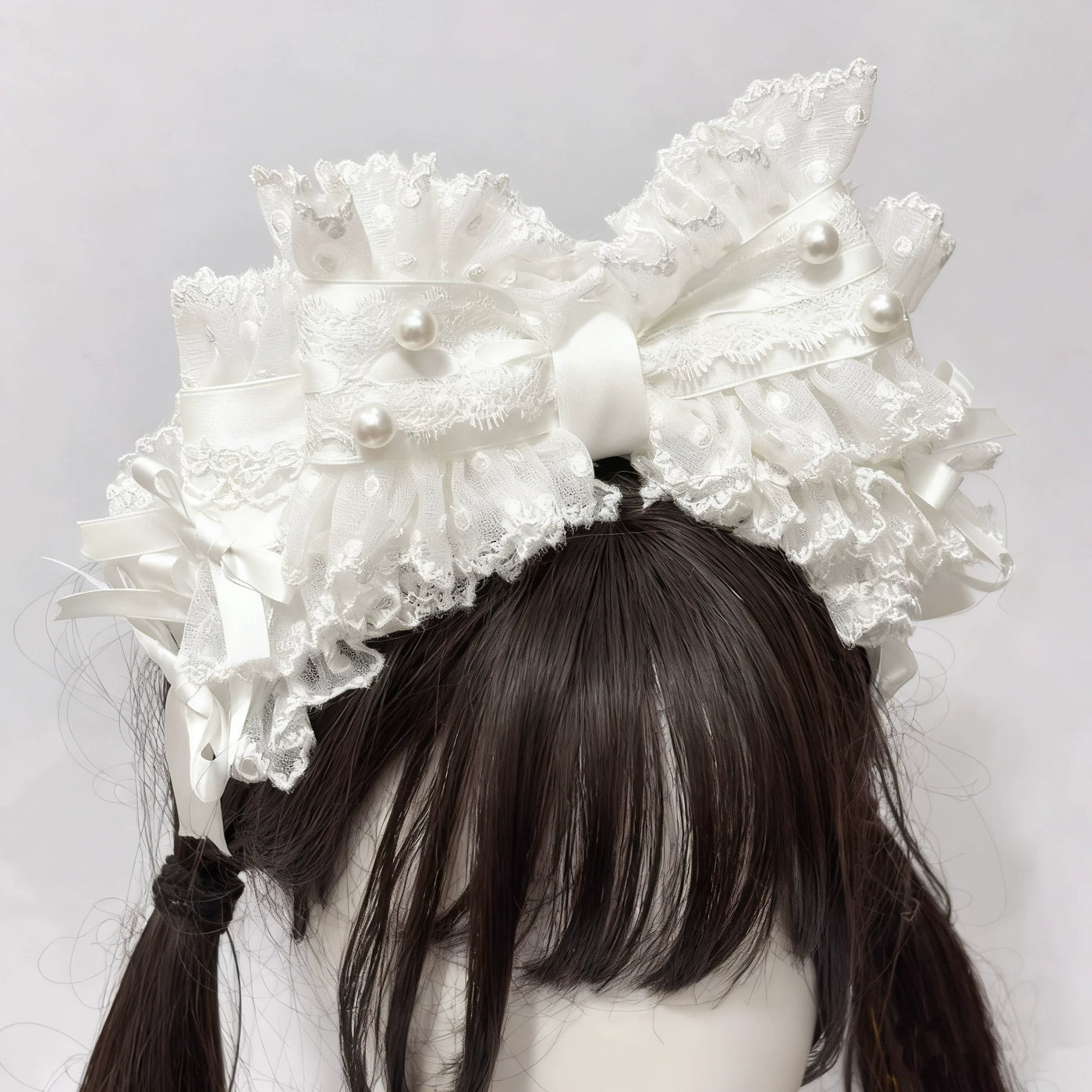 Cat Tart layered lace headwear with ribbon bows and pearl accents