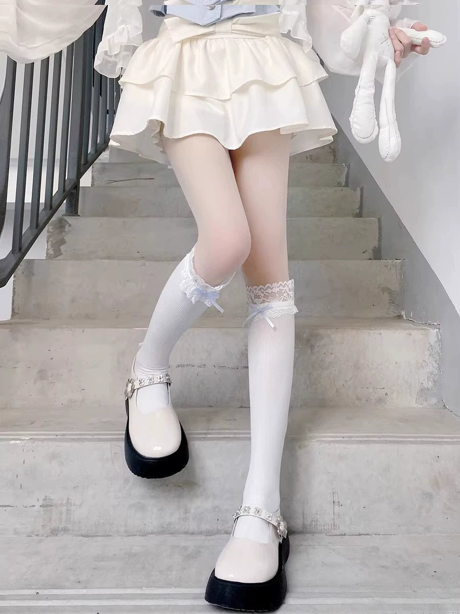 Floral Milk Cat white ribbed calf socks with lace cuffs and blue bows