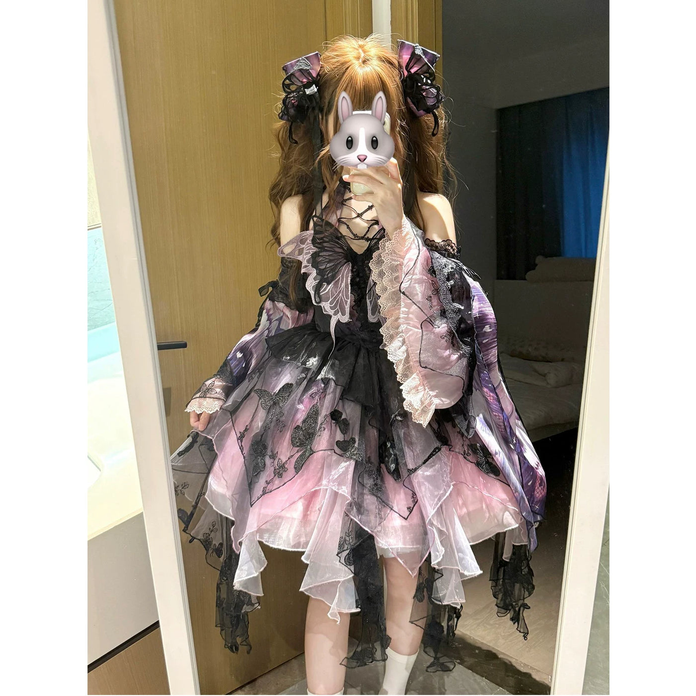 Layered purple Gothic Lolita skirt with asymmetrical hem and butterfly details
