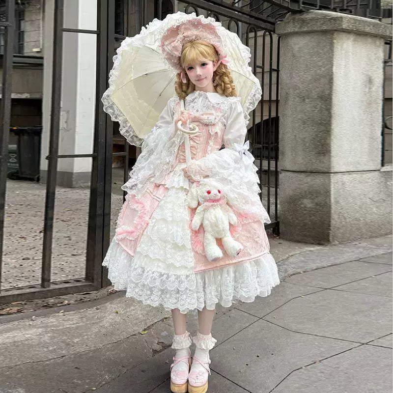 Pink-and-white lace JSK dress shown on a model and mannequin.