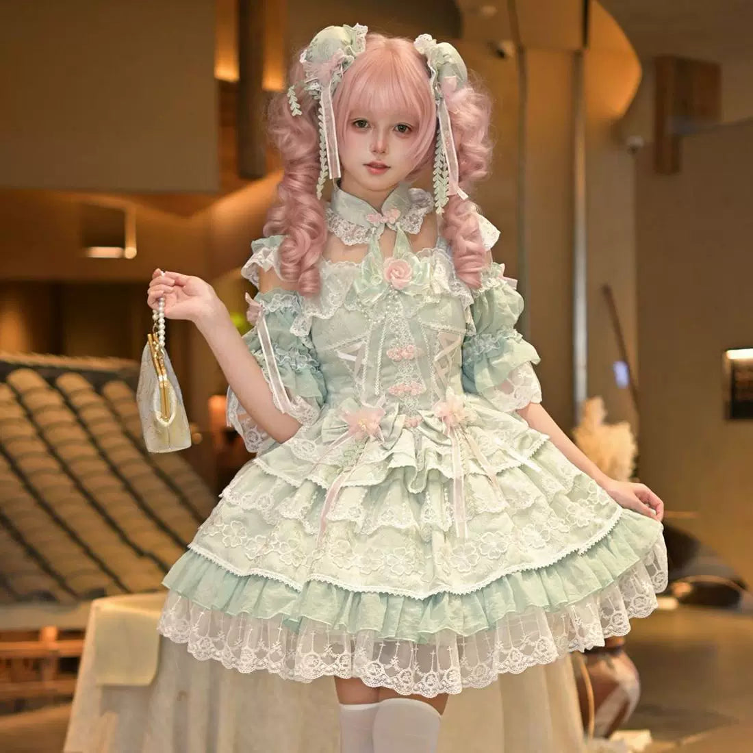 Lady Han Peach Rain Chinese Sweet JSK dress by Lolita Fetch with floral print and bow details on a mannequin.