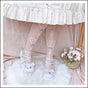 over knee socks / purple bow on white background