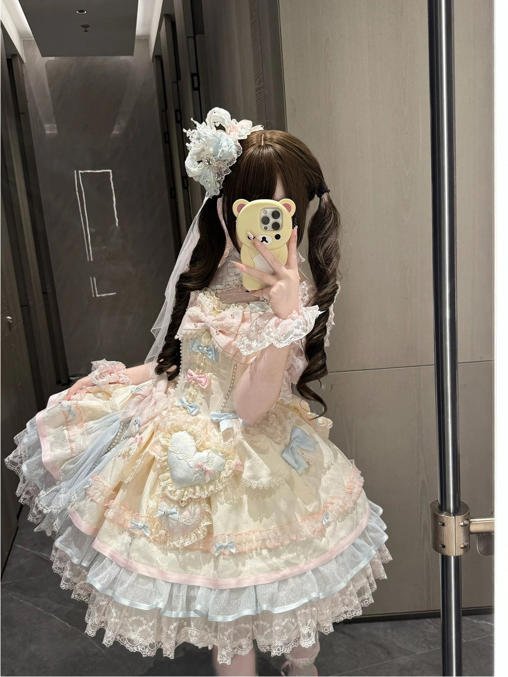 Blue-pink Creamy JSK suspender dress with layered lace, bows, veil and train.