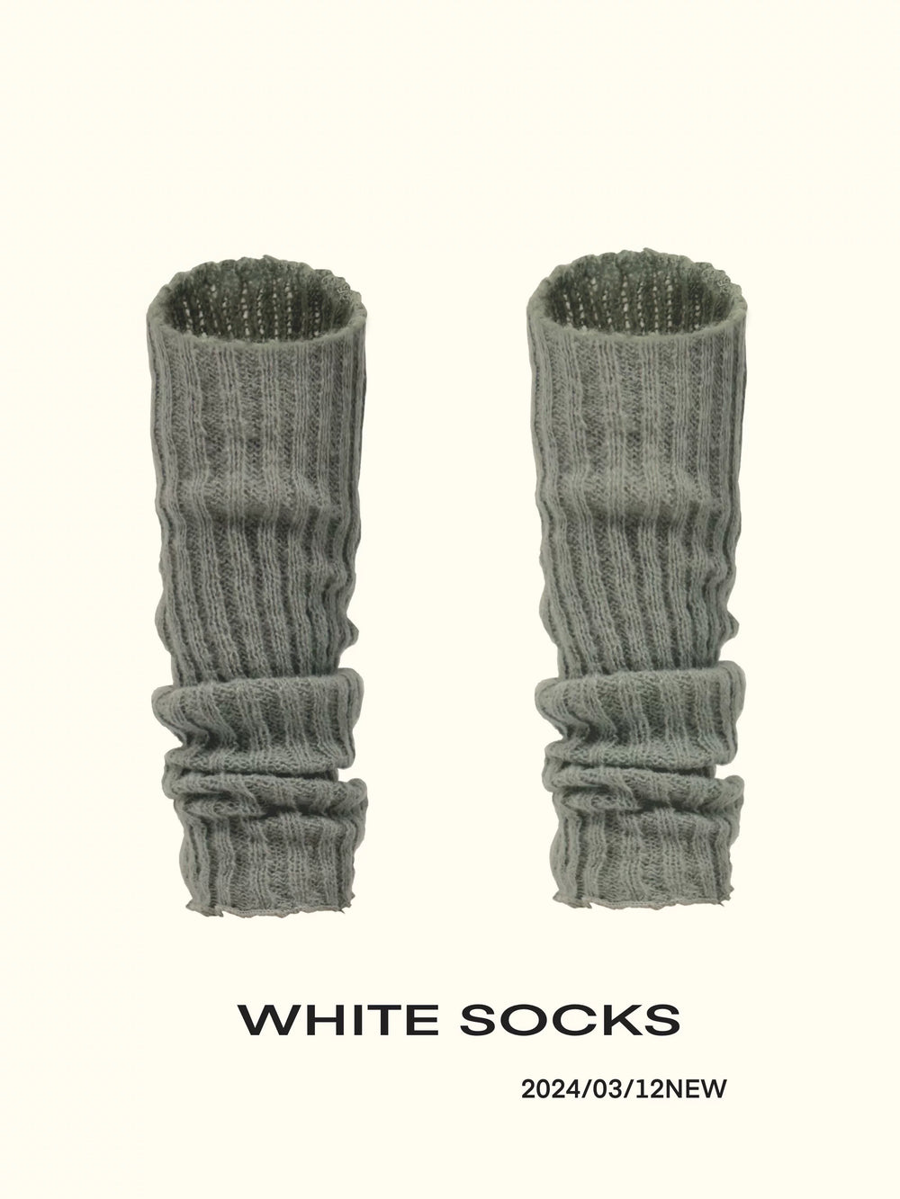 Ribbed slouch leg-warmer socks shown in grey, white, and black colourways.