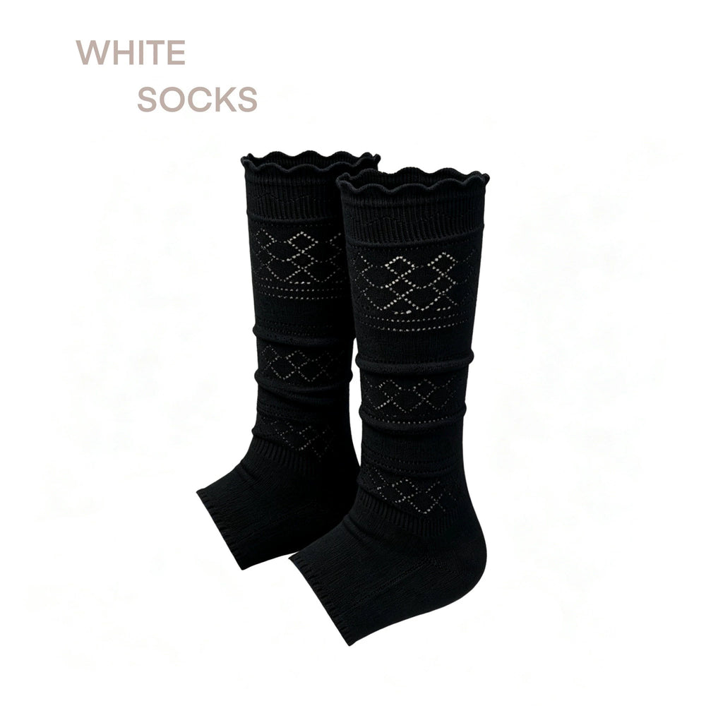 Model wearing white openwork footless socks with metallic sandals