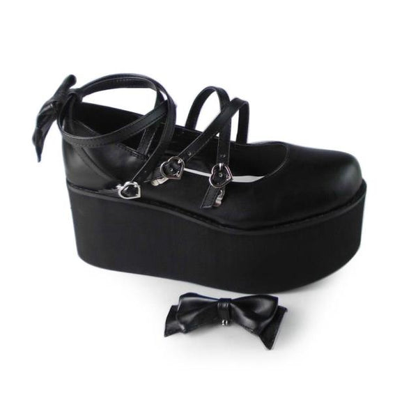 Black platform Lolita shoes with wraparound straps and detachable bow pieces
