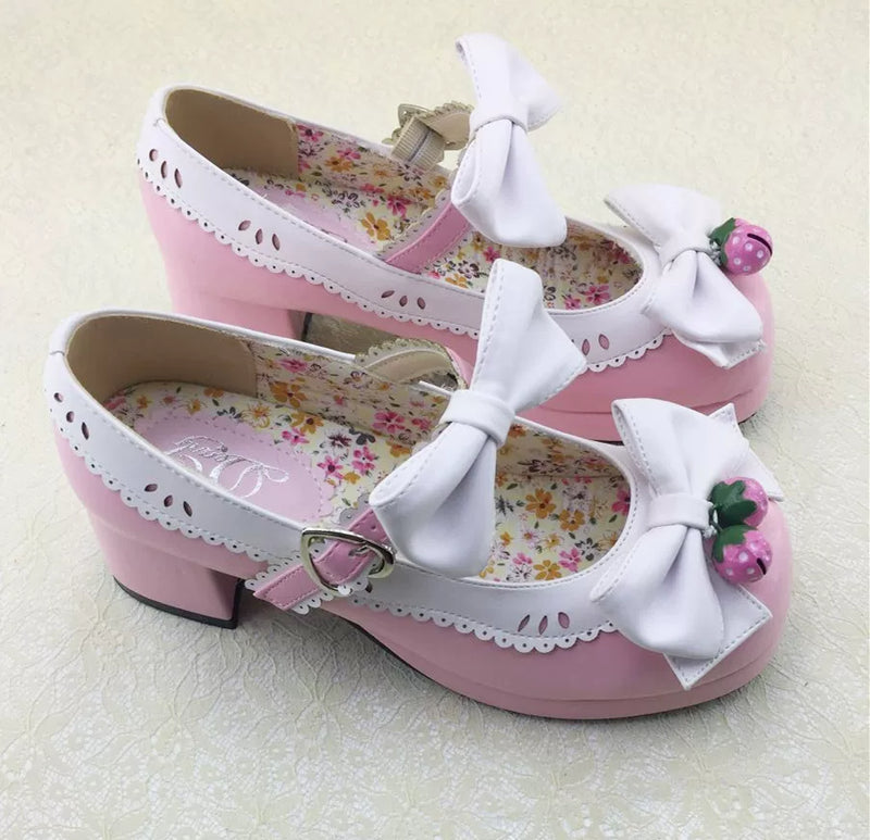 Meixie Strawberry Bell shoes in pale pink with white bows