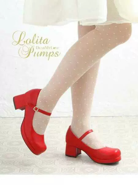 Meixie red platform Mary Jane heels styled with a white dress