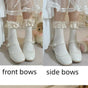 side bow / a pair of white socks with beige bows