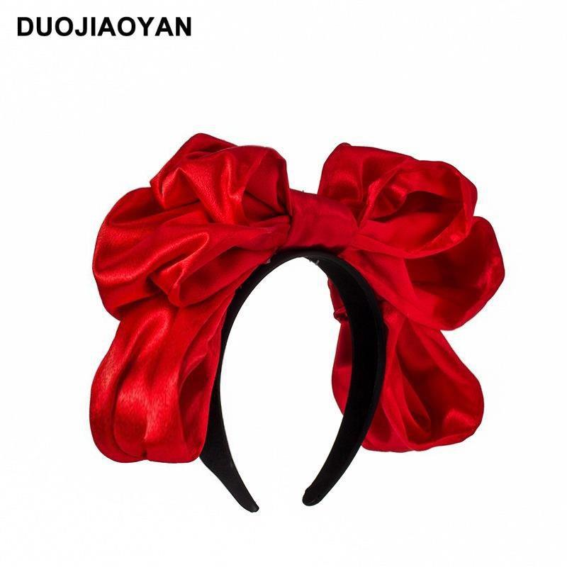 Handmade oversized satin and lace LolitaFetch hairband with a large bow, perfect as a stylish Lolita-style hair accessory.