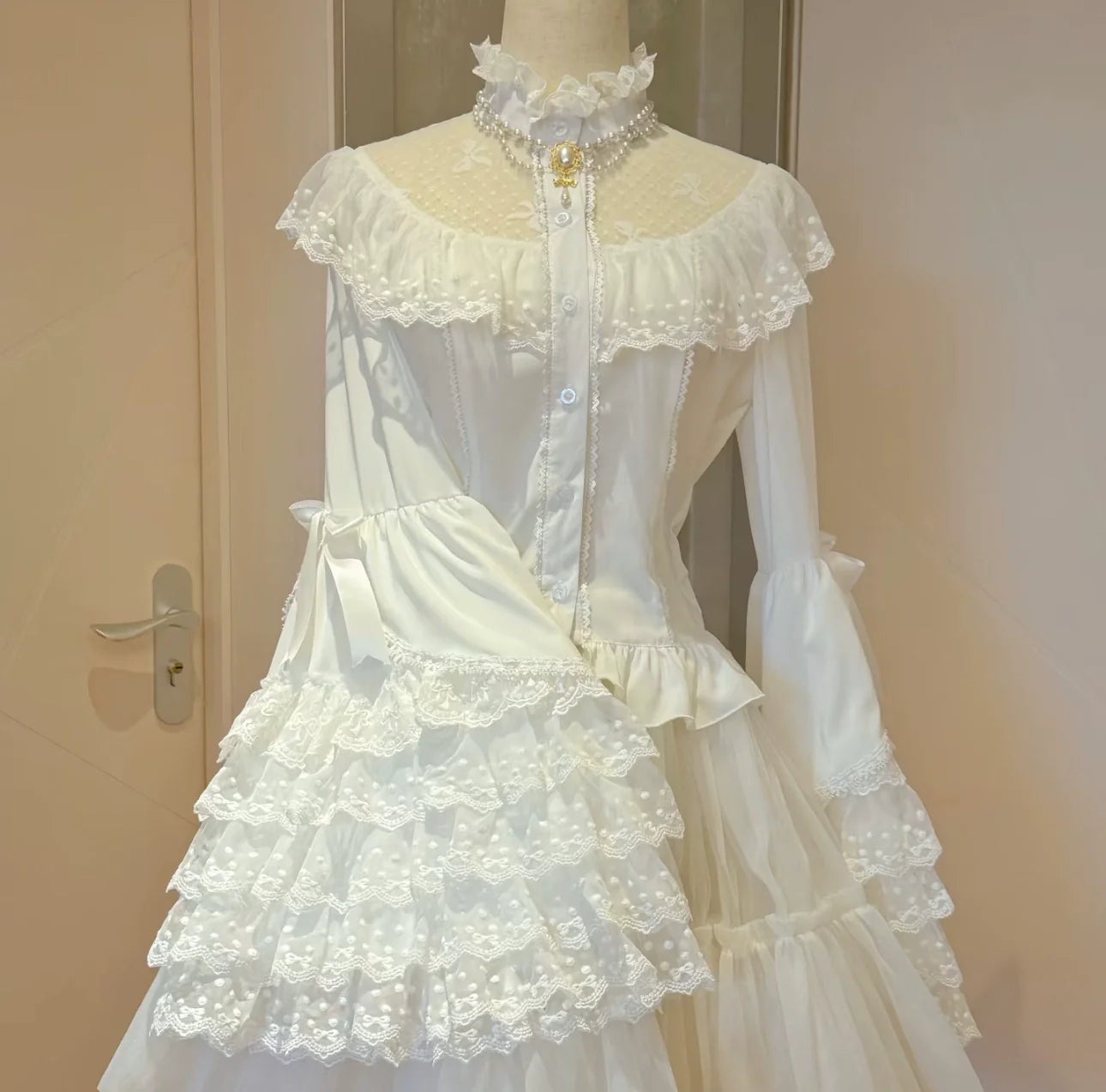 Snow Meow Sweet Princess Lolita floral lace trimmed bonnet in elegant pastel colors, perfect for Lolita fashion styles.