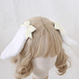 Oreilles de lapin blanc cassé