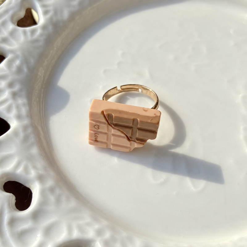 Bear doll coffee chocolate adjustable ring, close-up showing the charm and gold-tone band.