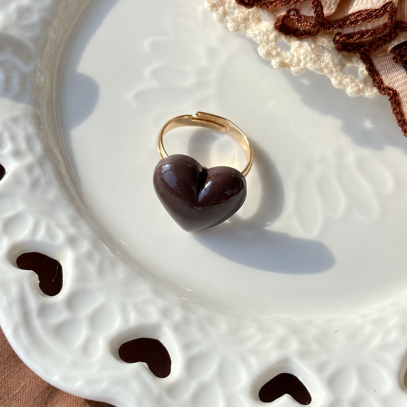 Bear doll heart chocolate adjustable ring, close-up showing the charm and gold-tone band.