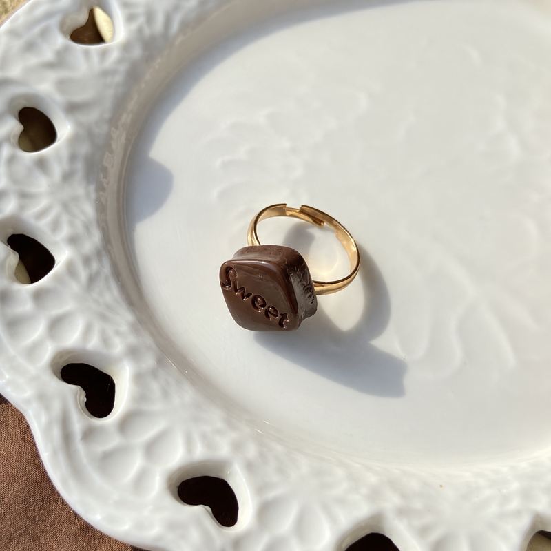Bear doll sweet dark chocolate adjustable ring, close-up showing the charm and gold-tone band.