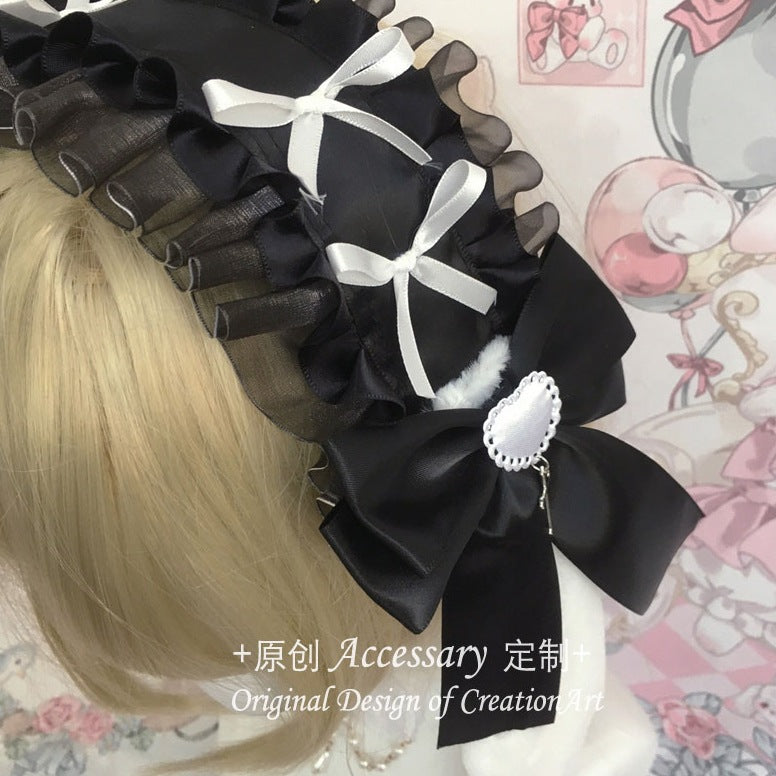 Black and pink Lolita lace headdress with bow, featuring white accents, suitable for girls' Lolita fashion accessories.