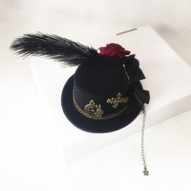 Vintage Gothic rose flower rabbit headdress by LolitaFetch featuring a dark Lolita style small hat and hair clip accessory.
