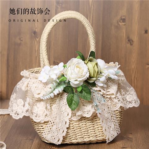 Handmade LolitaFetch straw bag with lace, artificial flower accents, soft pastel colors, ideal for beach or casual outings.