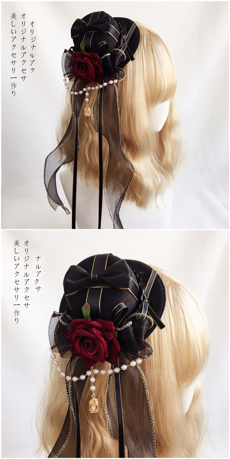Small handmade Lolita fashion hat with gothic style, featuring cyan and burgundy flower accents and a pill crown design.