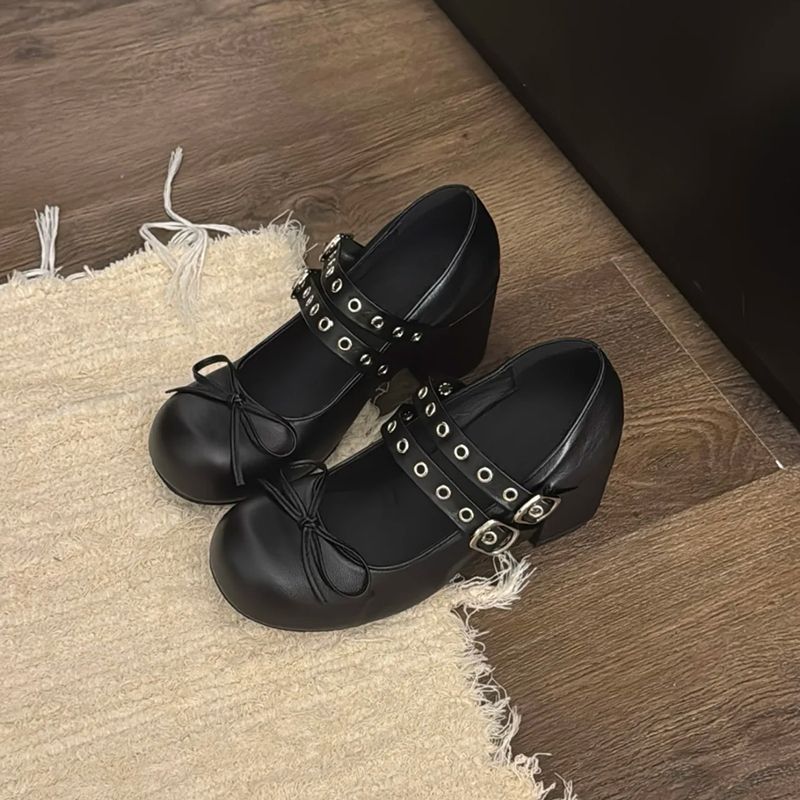 Pair of unbranded ballet-style chunky heel Lolita Mary Janes for summer, featuring classic design and ankle straps.
