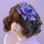Serre-tête double nœud violet