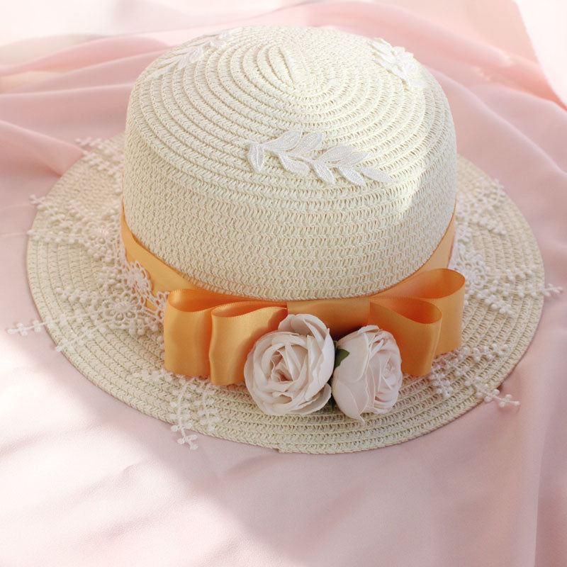 Elegant straw sun hat with a bowknot, designed by LolitaFetch, featuring a versatile, stylish headdress perfect for sunny days.