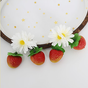 ein Paar Haarnadeln mit Farbverlauf-Blumen