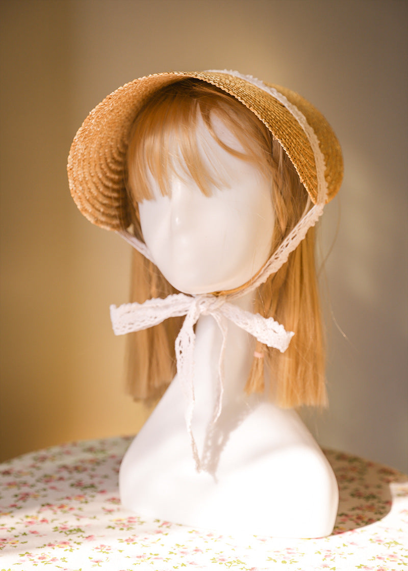 Vintage straw flat hat with lace strap from LolitaFetch, featuring DIY handmade details and vintage French-inspired accessories.