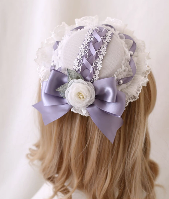 Xiaogui - Elegant Lolita Headdress Bow KC Cuffs Hairpins 4. A small top hat with a fixed clip