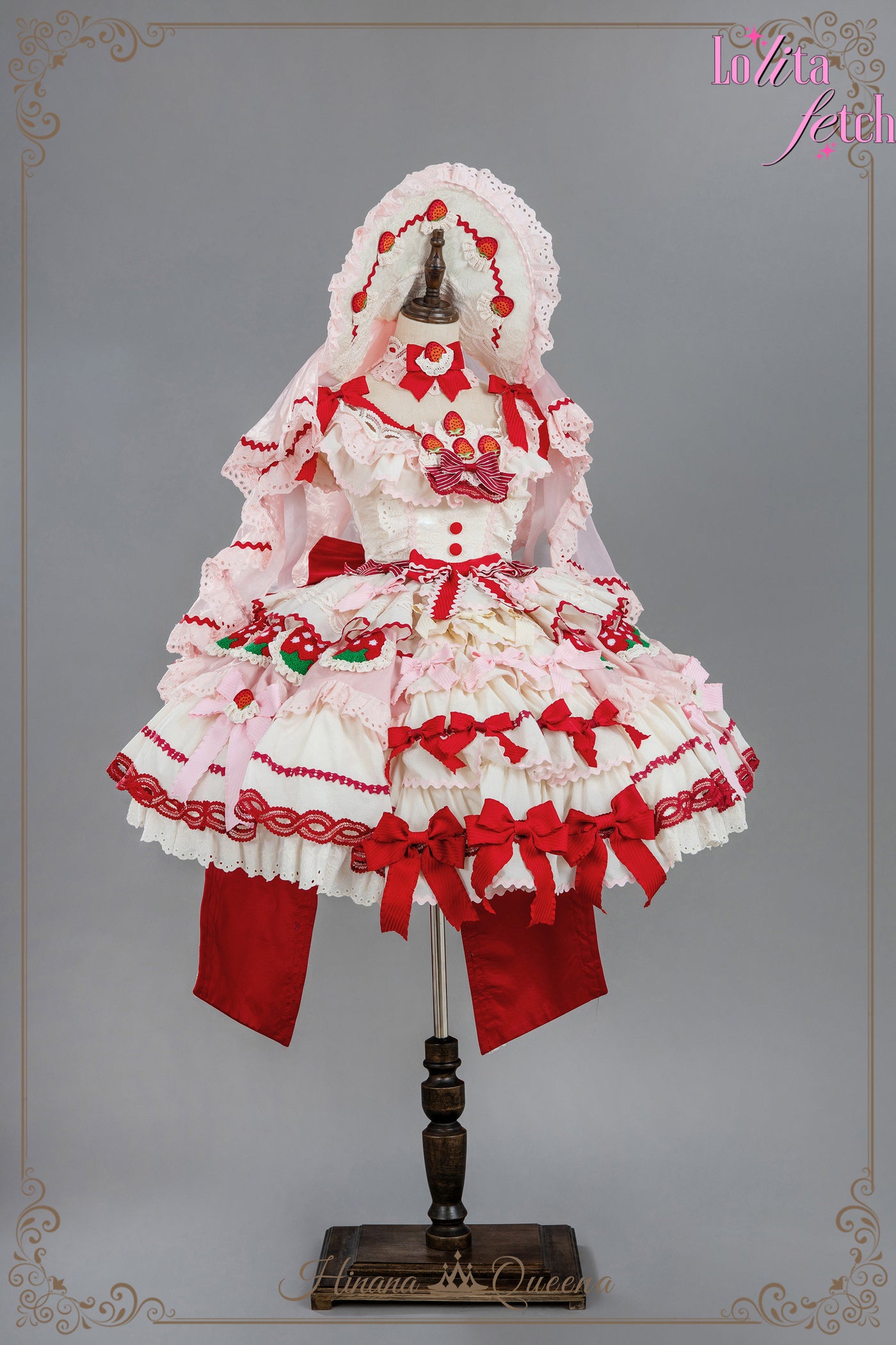 Gorgeous strawberry-themed Lolita Fetch wedding dress with lace and ruffles, featuring a JSK and OP in a romantic, elegant style.