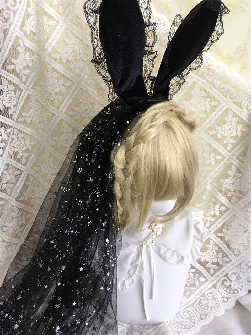Dark gothic Lolita black bunny ear headband with veil and French star details, featuring rose accents and intricate gothic design.