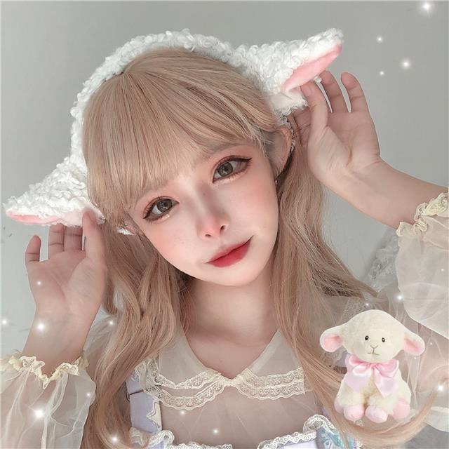 Handmade Lolita Sheep Ear Headband with soft animal hair and cute sheep ears, perfect as an animal-themed hair accessory.