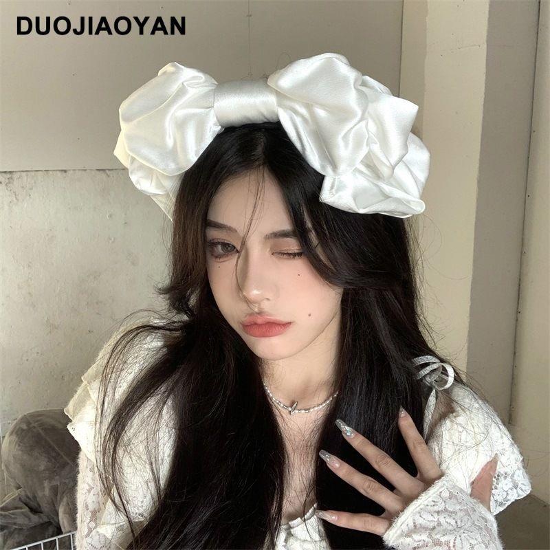 Handmade oversized satin and lace LolitaFetch hairband with large bow, elegant headwear accessory for stylish looks.