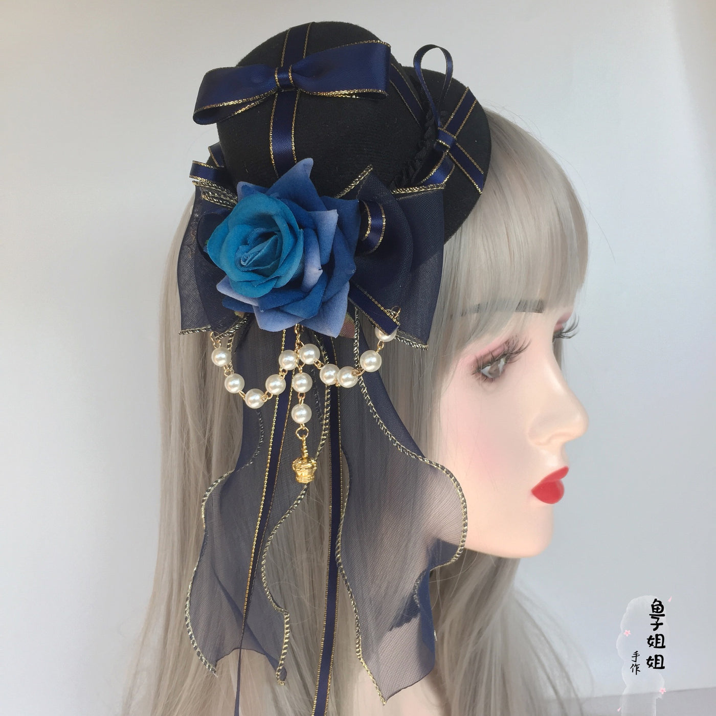 Small handmade Gothic Lolita hat by LolitaFetch featuring cyan and burgundy flower accents and a pill crown headwear style.