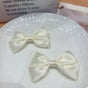 Ivory Bow Brooch Pair Set